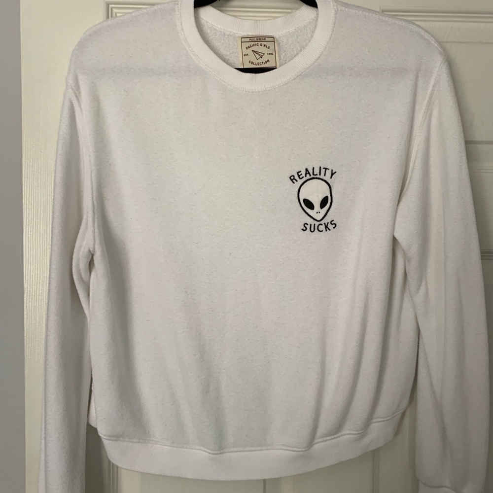 white sweater